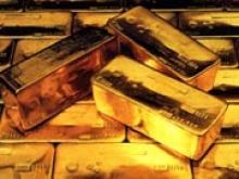 Нацбанк закупает золото для спасения гривни