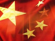 Китай назвал ошибочным решение S&P понизить суверенный рейтинг страны