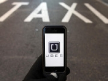 Японская группа SoftBank может купить долю в Uber