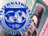 Украина начала отдавать кредиты МВФ
