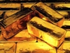 Цена золота опустилась ниже 1560 долл./унция впервые с декабря 2011 г.