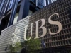 Прибыль банка UBS снизилась почти в два раза
