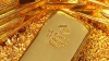 Золото подешевело в понедельник на коррекции и росте курса доллара